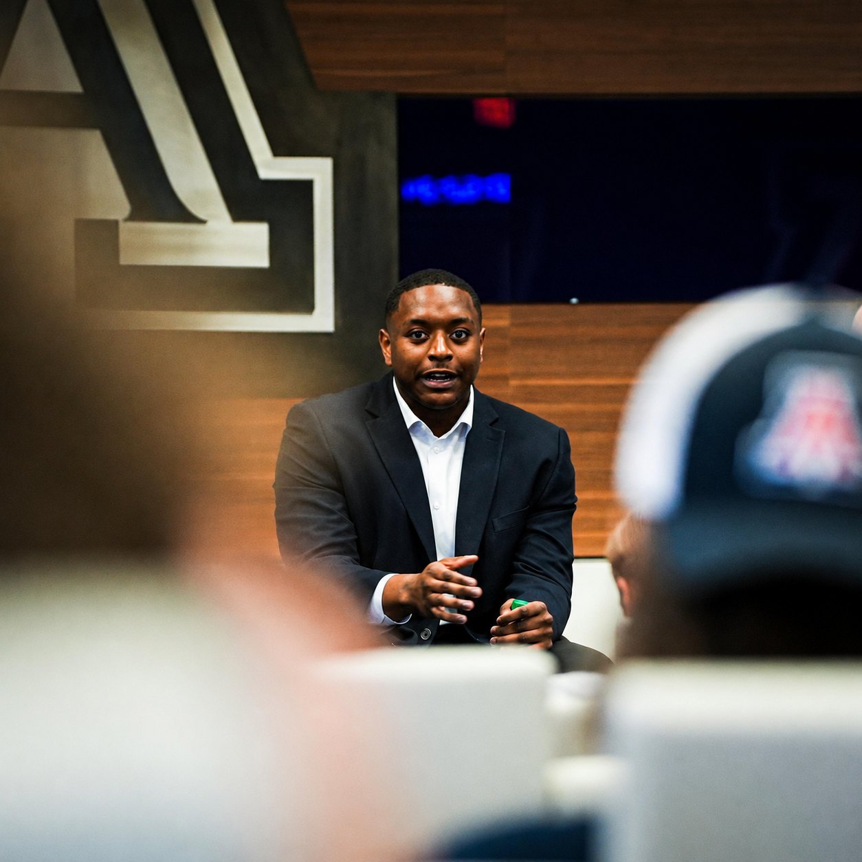 Markus Stevenson speaking before an audience
